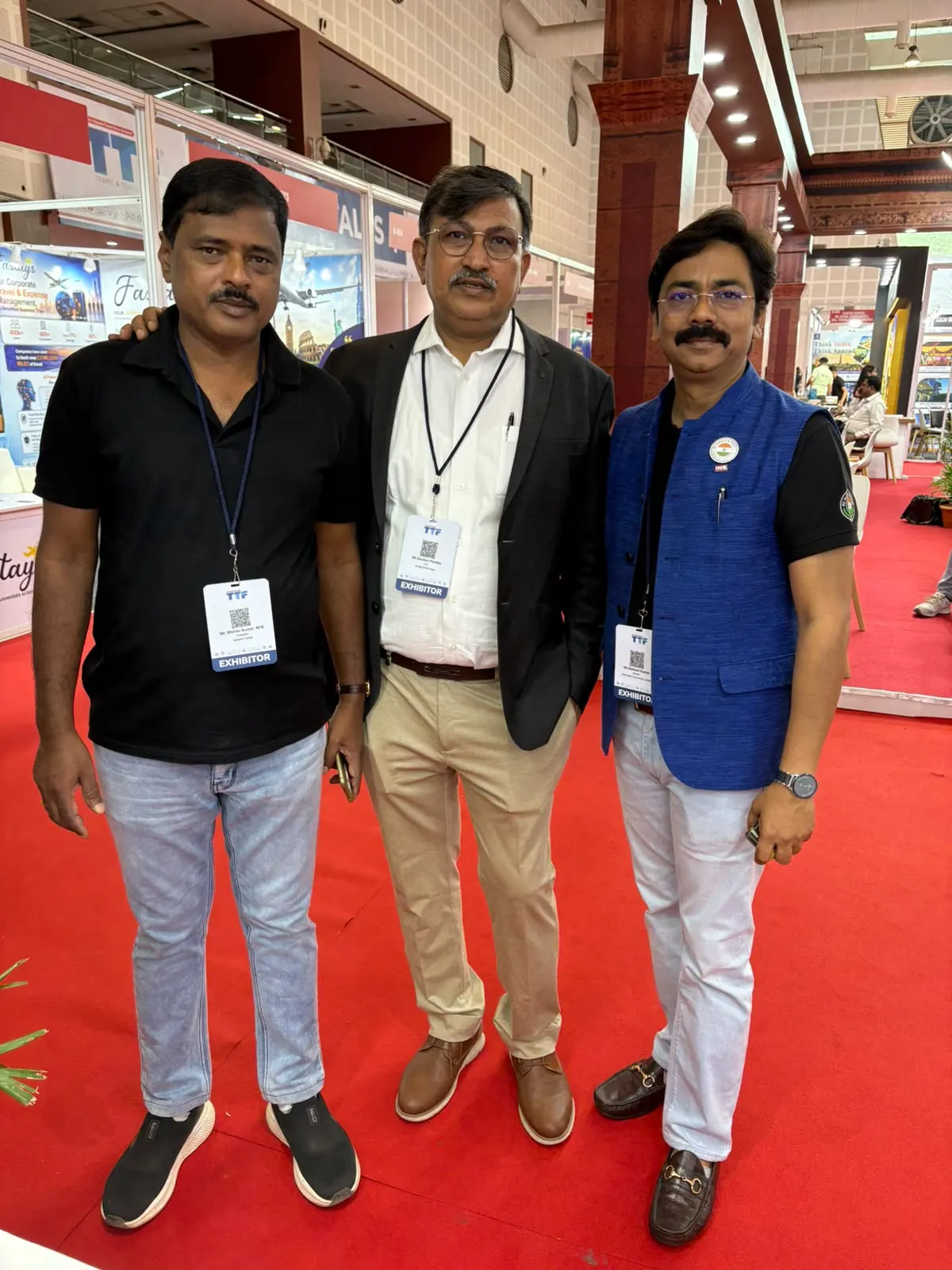 Dynamic Travels founders at a tourism event
